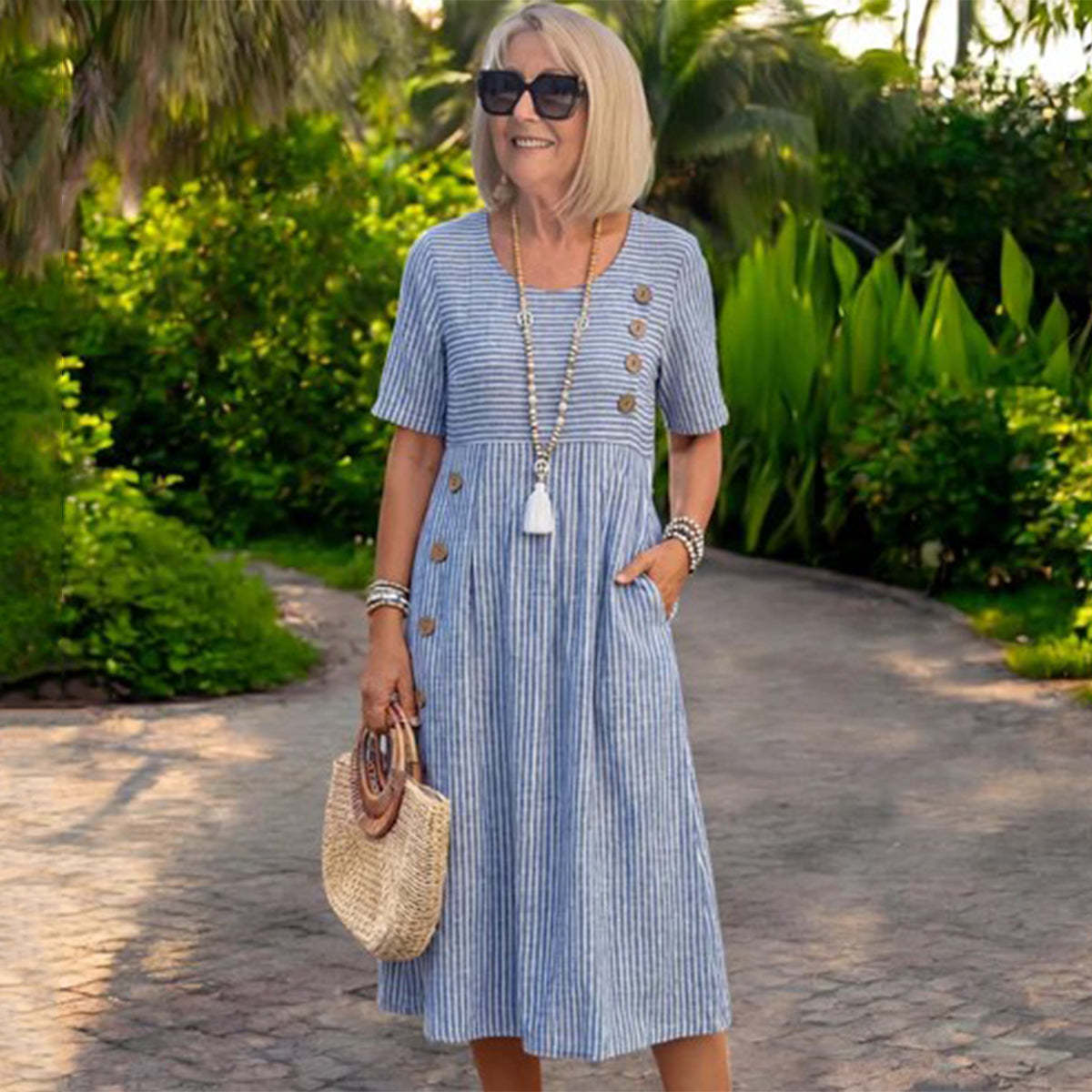 💖👗【S-2XL】Julia – Ľahké a splývavé pruhované midi šaty - zvislé pruhy opticky predlžujú siluetu a vytvárajú elegantnejší vzhľad.