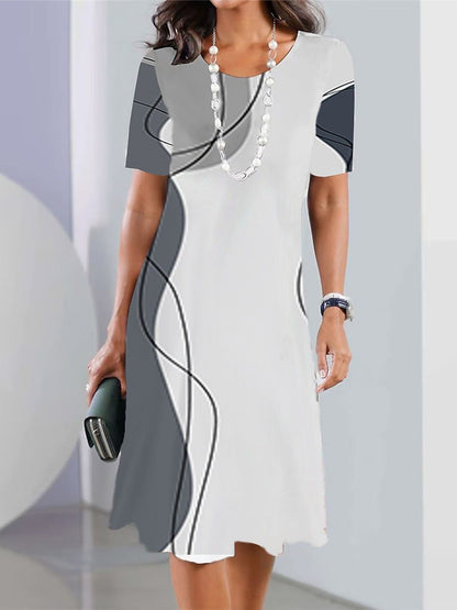👗【XS-5XL】Nové dámské módní šaty s kulatým výstřihem s potiskem pro jaro a léto 2025 --3932697