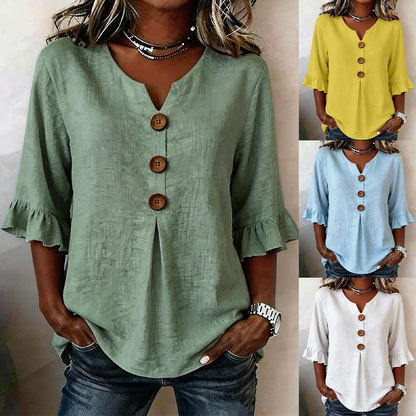 Camiseta de mujer cómoda y transpirable con mangas abullonadas y diseño de cuello en V con botones.