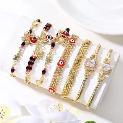 📿 ¡OFERTA POR TIEMPO LIMITADO CON UN 50% DE DESCUENTO! 🌀 Pulsera boho con amuletos y un elefante de la suerte: colgantes simbólicos, forma ajustable, baño de oro y 7 estilos ✨