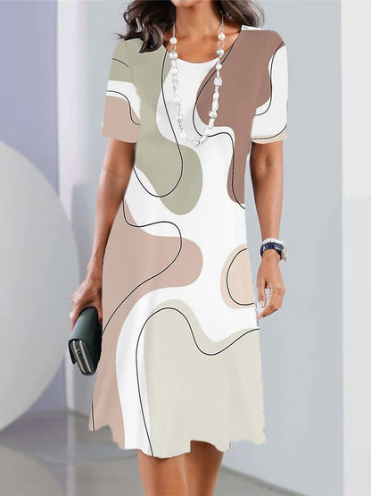 👗【XS-5XL】Nové dámské módní šaty s kulatým výstřihem s potiskem pro jaro a léto 2025 --3932697
