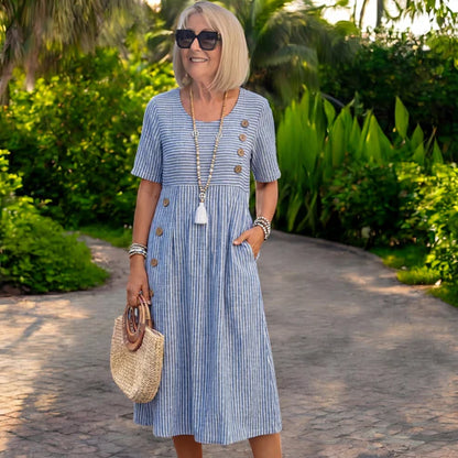 💖👗【S-2XL】Julia – Ľahké a splývavé pruhované midi šaty - zvislé pruhy opticky predlžujú siluetu a vytvárajú elegantnejší vzhľad.